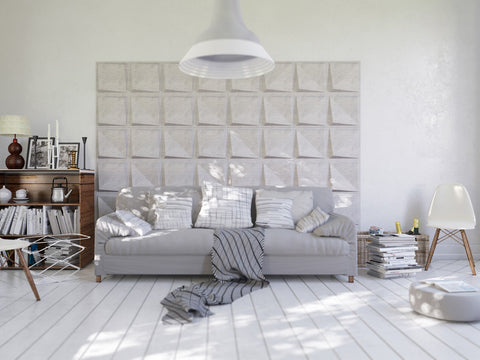 living room with acoustic tiles and sofa