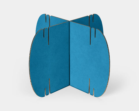 Two cyan Nomad System cardboard modules showing the bright blue-green color option and modular design