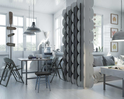 Nomad System room divider effectively separating a single space into two distinct functional areas