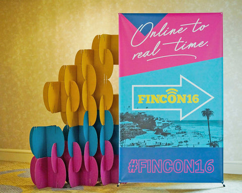 Nomad System cardboard room divider configured as a decorative banner backdrop for events or commercial displays