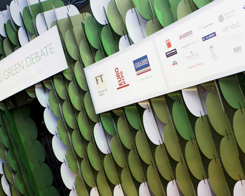Close-up detail of green Nomad System cardboard room divider showing texture and sustainable materials