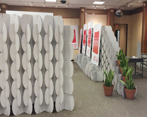 Alternative view of Nomad System cardboard room dividers creating a professional interview space