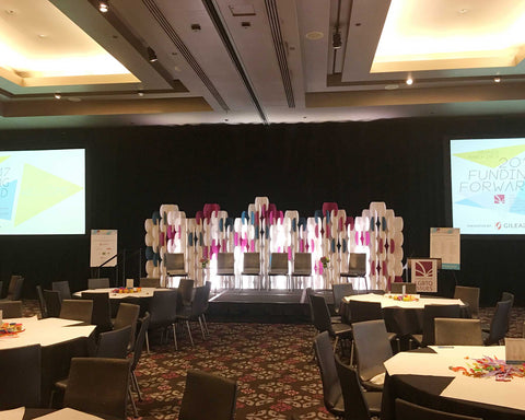 Nomad System room divider panels configured as a custom backdrop for professional photography or events
