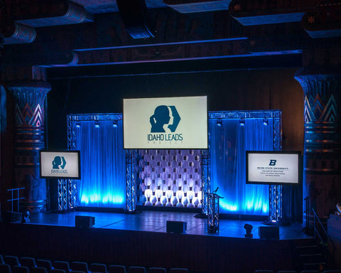 Nomad System room divider installed as alternative to traditional stage curtains with modern aesthetics