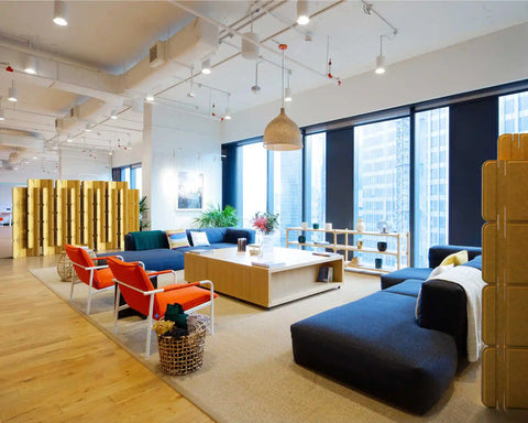 Nomad System felt room divider creating a private breakout meeting space in open office environment with sound absorption