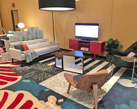 Nomad System felt room divider integrated with multimedia display creating functional presentation space