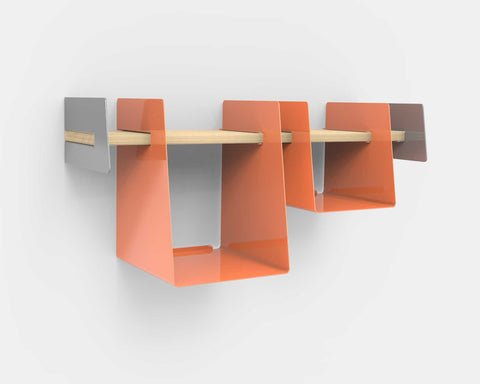 Wall-mounted shelf with orange storage bins