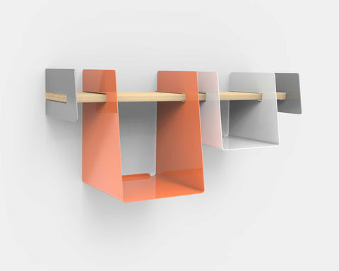 Wall-mounted shelf with white and orange storage bin