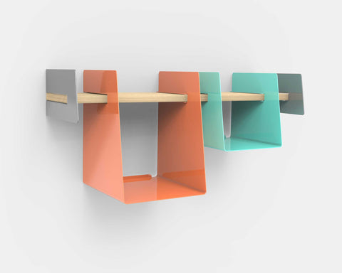 Wall-mounted shelf with aqua and salmon cubbies