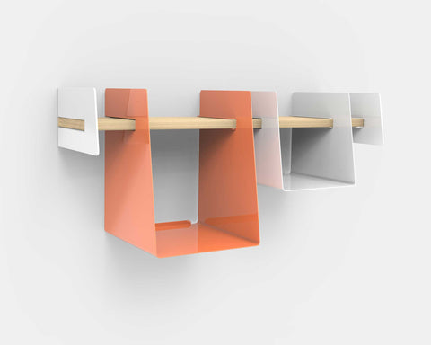 Wall-mounted shelf with white and salmon cubbies
