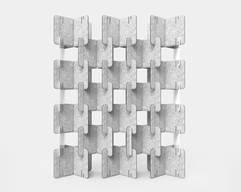 Four boxes of Nomad System felt modules in open assembly demonstrating bulk installation capability