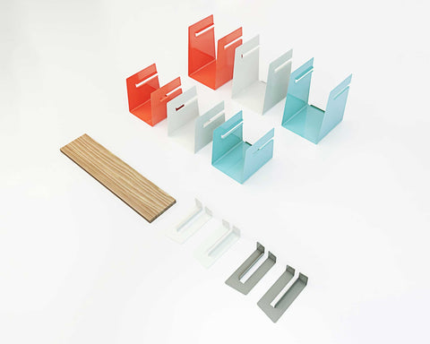 Set of colorful metal brackets on a white background