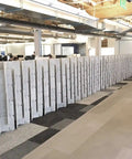 Nomad System Felt PRO Acoustic Room Divider arranged as a long continuous wall in an open office space