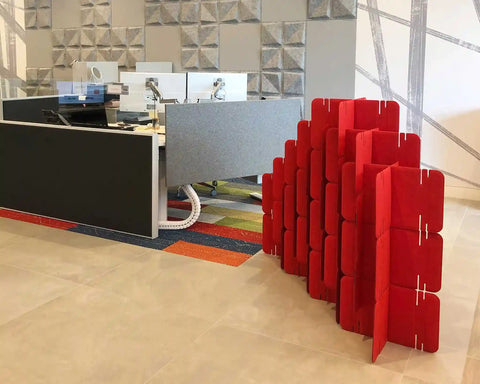Nomad System Felt PRO Acoustic Room Divider installed in a reception area creating visual separation