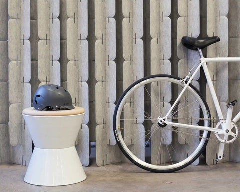Nomad System felt wall divider paired with coordinating flip stools for complete modular workspace solution