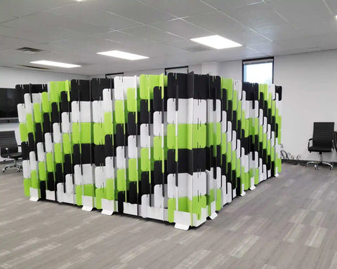 Mio Sled portable room divider creating focused work space in open floor plan