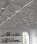 Quad FeltForms 2' x 2' Acoustic ceiling tiles in mottled white detail in the living room.