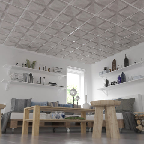 Quad FeltForms 2' x 2' Acoustic ceiling tiles in mottled white installed in a living room with shelves.