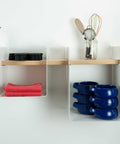 open kitchen shelf with bowls and utensils