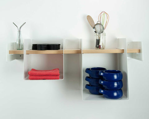 open kitchen shelf with bowls and utensils